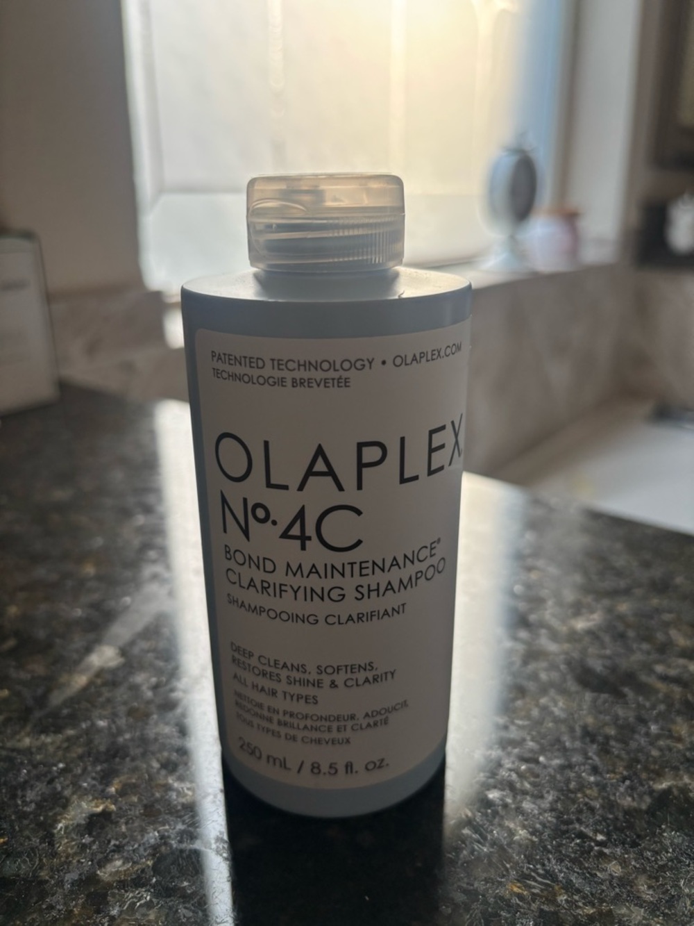 OLAPLEX No.4C Clarifying Shampoo - White and Black Packaging